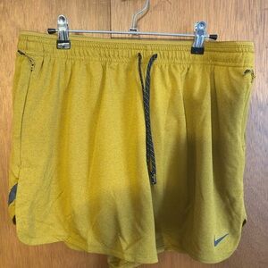 Nike Running Division Stride 4” Yellow Athletic Shorts